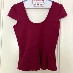 Bebe peplum top large